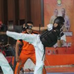 Kontingen Tarung Derajat Jawa Timur menggenakan body protector warna hitam dalam PON Aceh-Sumut 2024 | Foto: Fariz/Dap