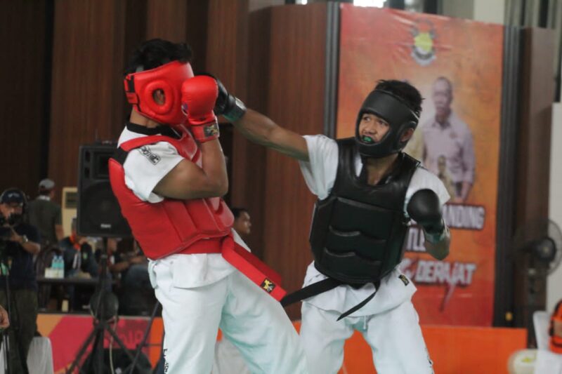 Atlet Tarung Derajat Jatim Aryo Pandu memakai body protector warna hitam dalam final PON Aceh-Sumut 2024 | Foto: Utomo/DAP
