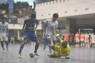 Pertandingan final cabor futsal putra Porprov IX Jawa Timur 2025 antara tim Kota Malang dan Surabaya di Graha Polinema, Kota Malang, Jumat (27/6/2025) | Sumber Foto: Dimas AP/BI