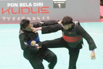 Sudut merah: Pesilat Jawa Timur, Alvin Risqullah Fadillah, meraih kemenangan dan melaju babak final | Foto: Dap/BI