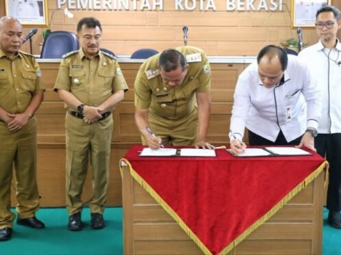 Acara penandatanganan dan penyerahan aset dilakukan di Kantor Pemkot Bekasi, Senin (14/9/2026). (Foto: dok. KPK)
